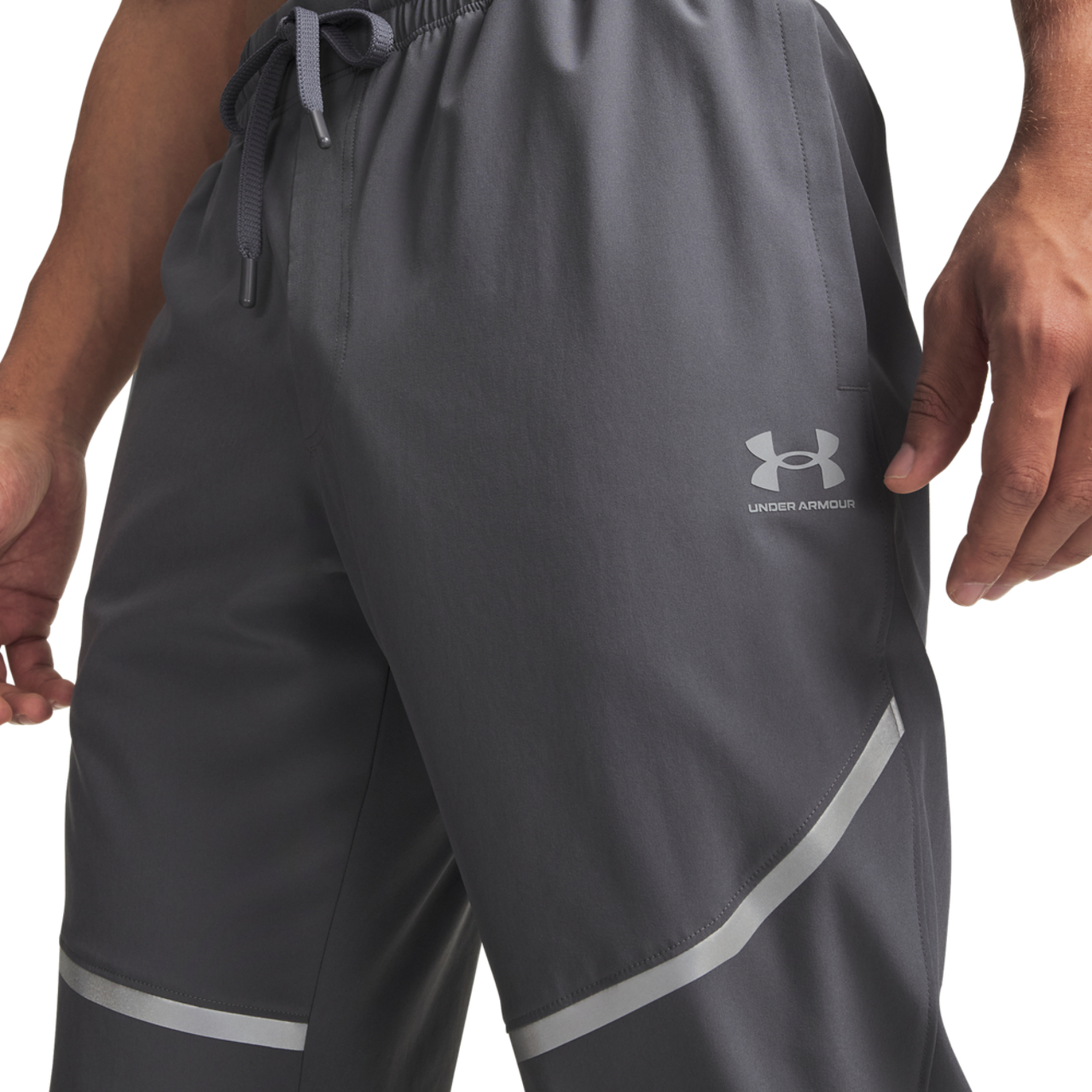 Under Armour Vibe Woven Reflective Pants Image 1 of 4. Tap to open photo gallery.