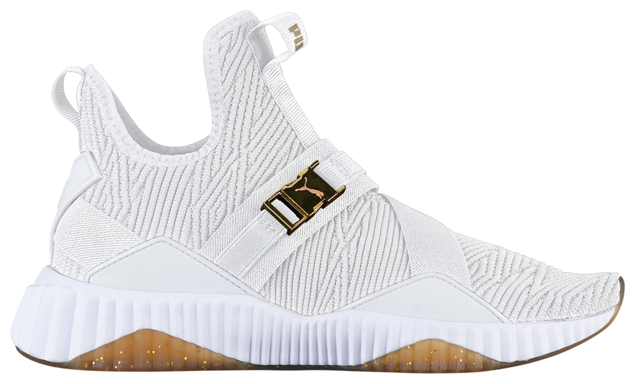 PUMA Defy Mid Varsity Champs Sports