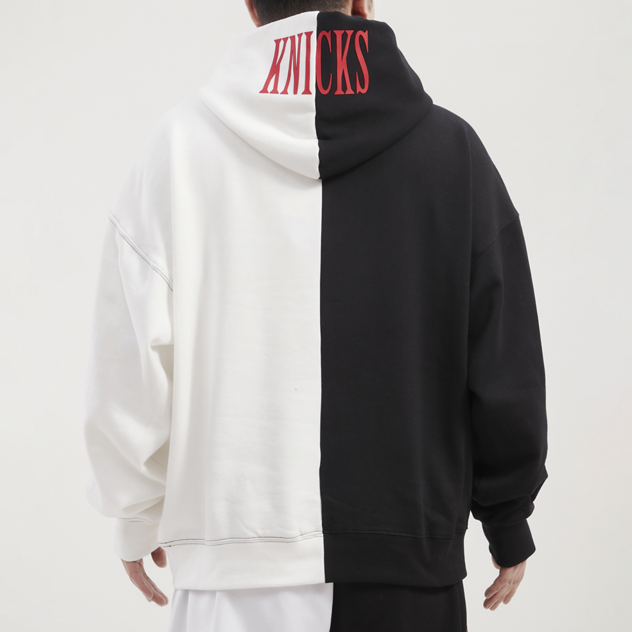 Pro Standard Knicks Split Drop Shoulder Pullover Hoodie Image 2 of 4. Tap to open photo gallery.