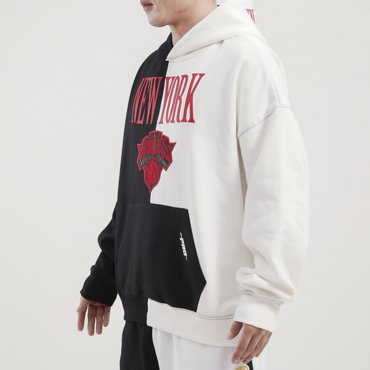Pro Standard Knicks Split Drop Shoulder Pullover Hoodie Image 4 of 4. Tap to open photo gallery.