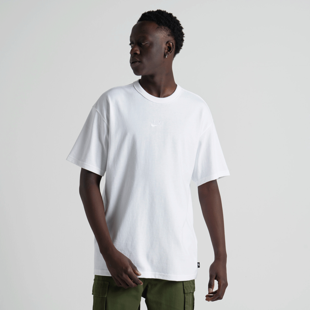 Nike Sportswear Premium Essentials Image 1 of 7. Tap to open photo gallery.