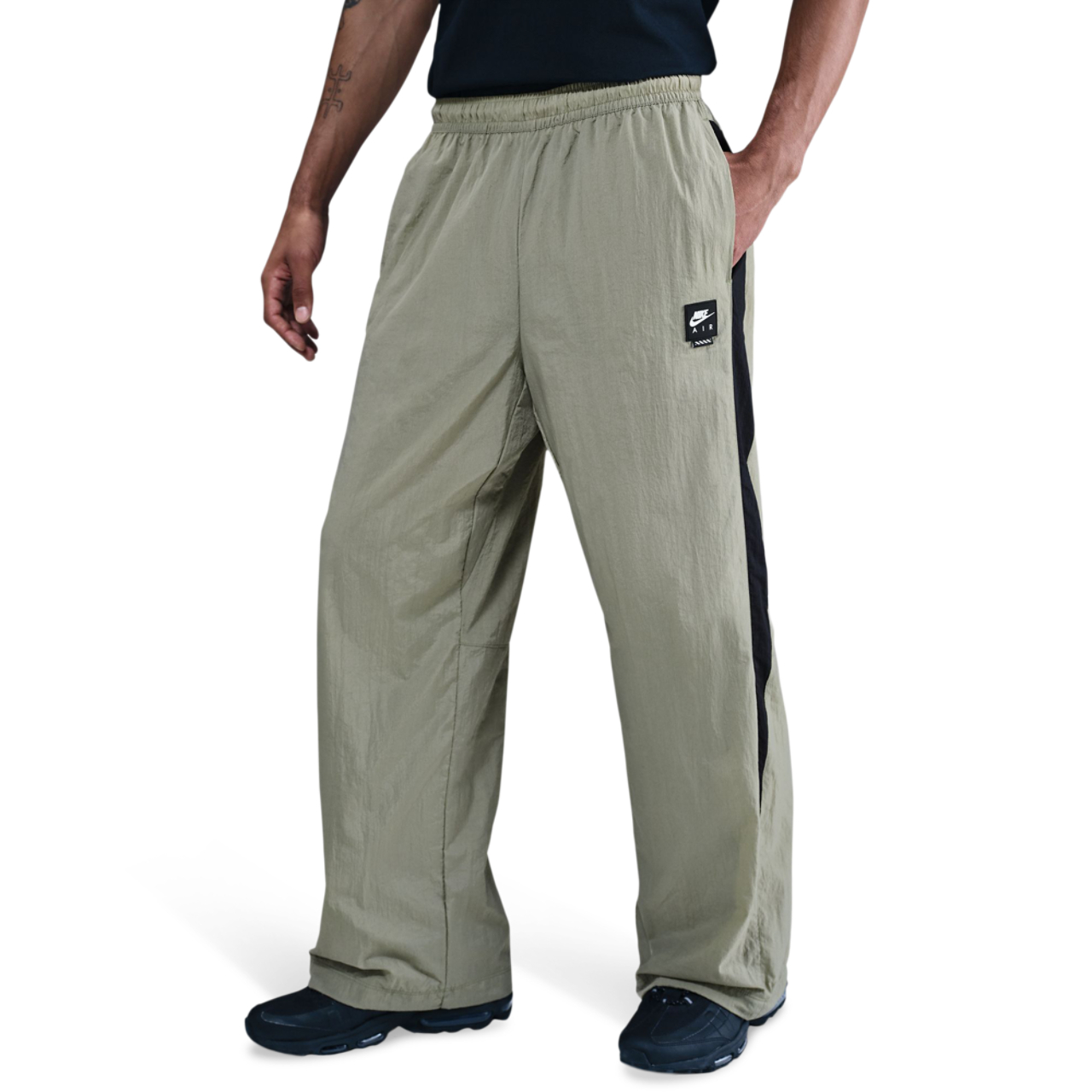 Nike Air Woven Track Pants Image 1 of 7. Tap to open photo gallery.