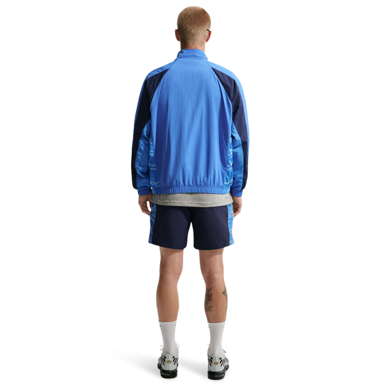 Nike Tuned Woven Tracktop Jacket Image 4 of 6. Tap to open photo gallery.