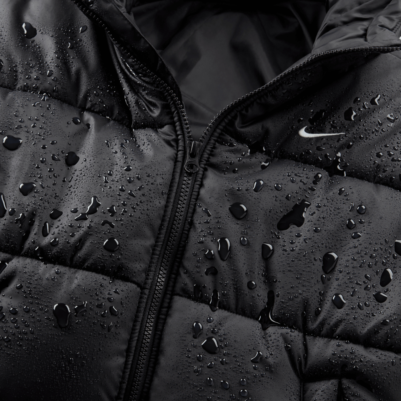 Nike Sportswear Puffer Therma-FIT Loose Hooded Jacket Image 4 of 7. Tap to open photo gallery.