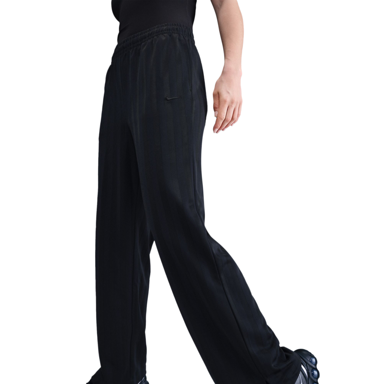 Nike Sportswear Mid-Rise Loose Jacquard Striped Track Pants Image 1 of 5. Tap to open photo gallery.