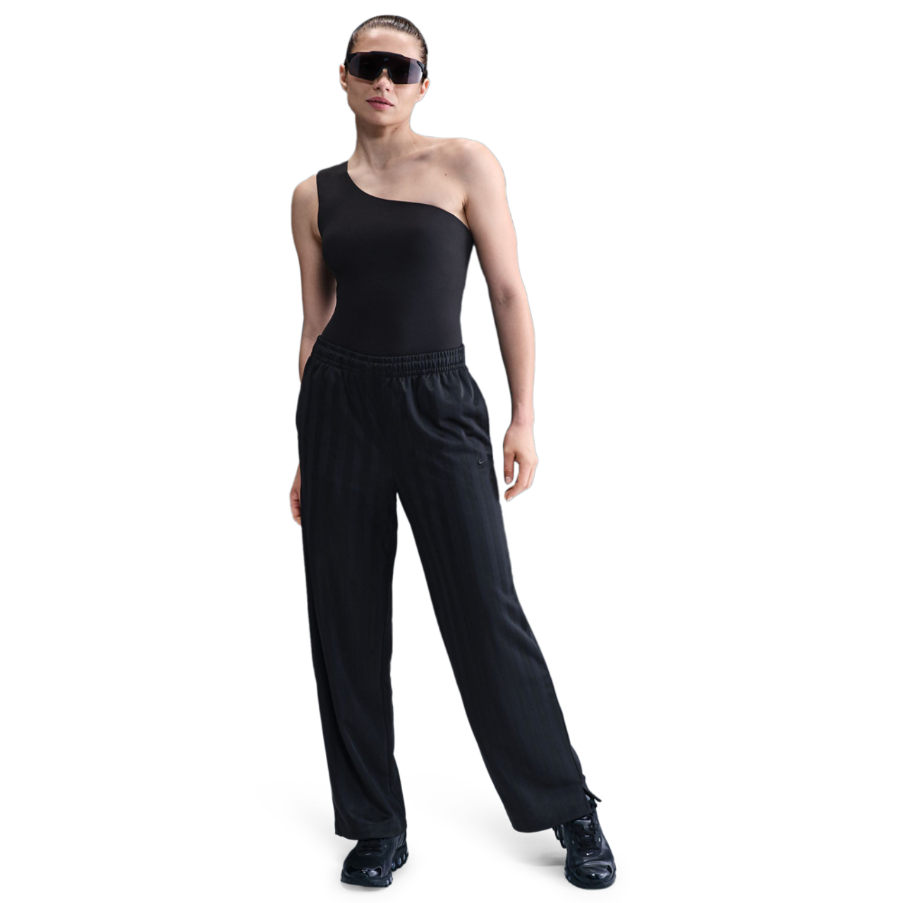 Nike Sportswear Mid-Rise Loose Jacquard Striped Track Pants Image 2 of 5. Tap to open photo gallery.