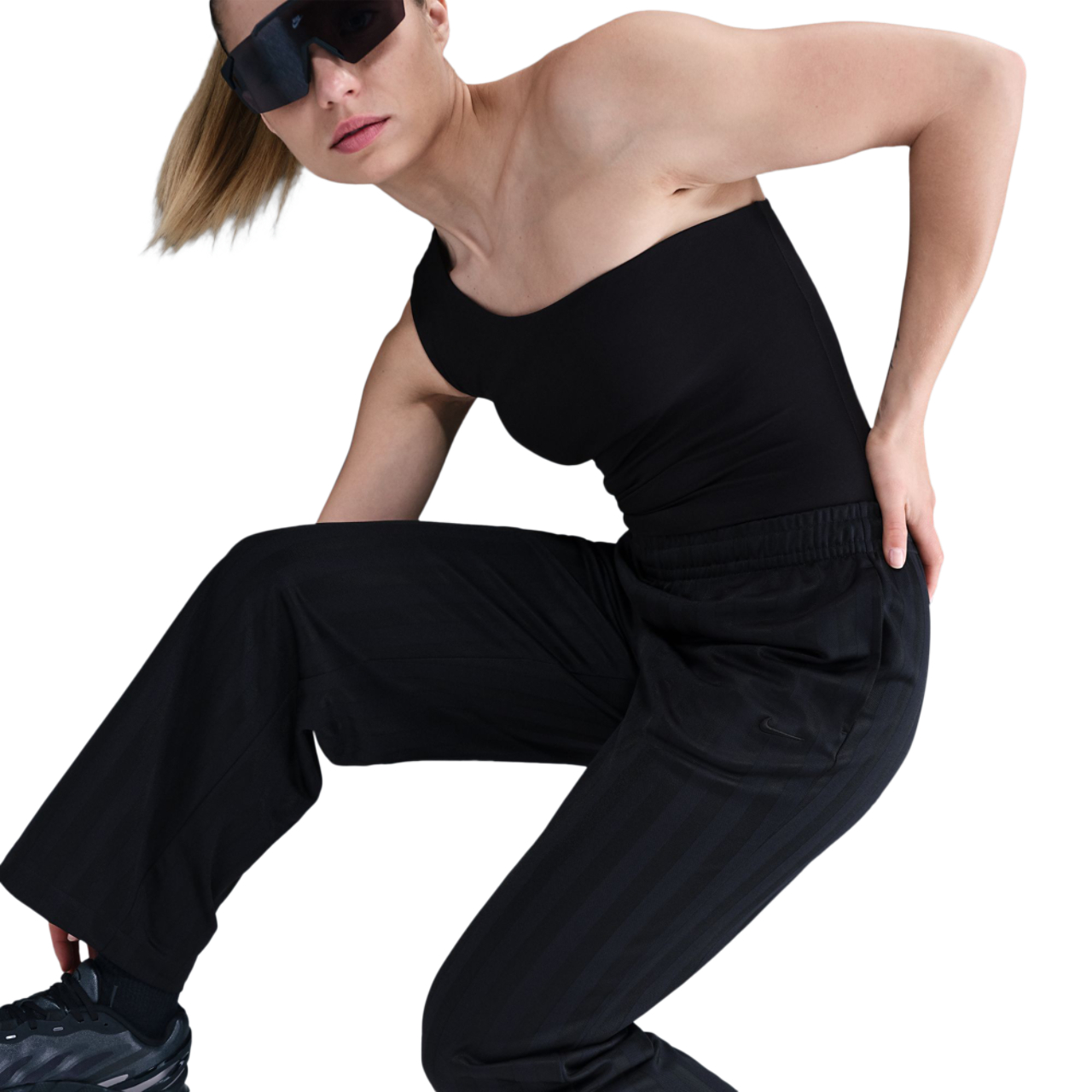 Nike Sportswear Mid-Rise Loose Jacquard Striped Track Pants Image 4 of 5. Tap to open photo gallery.