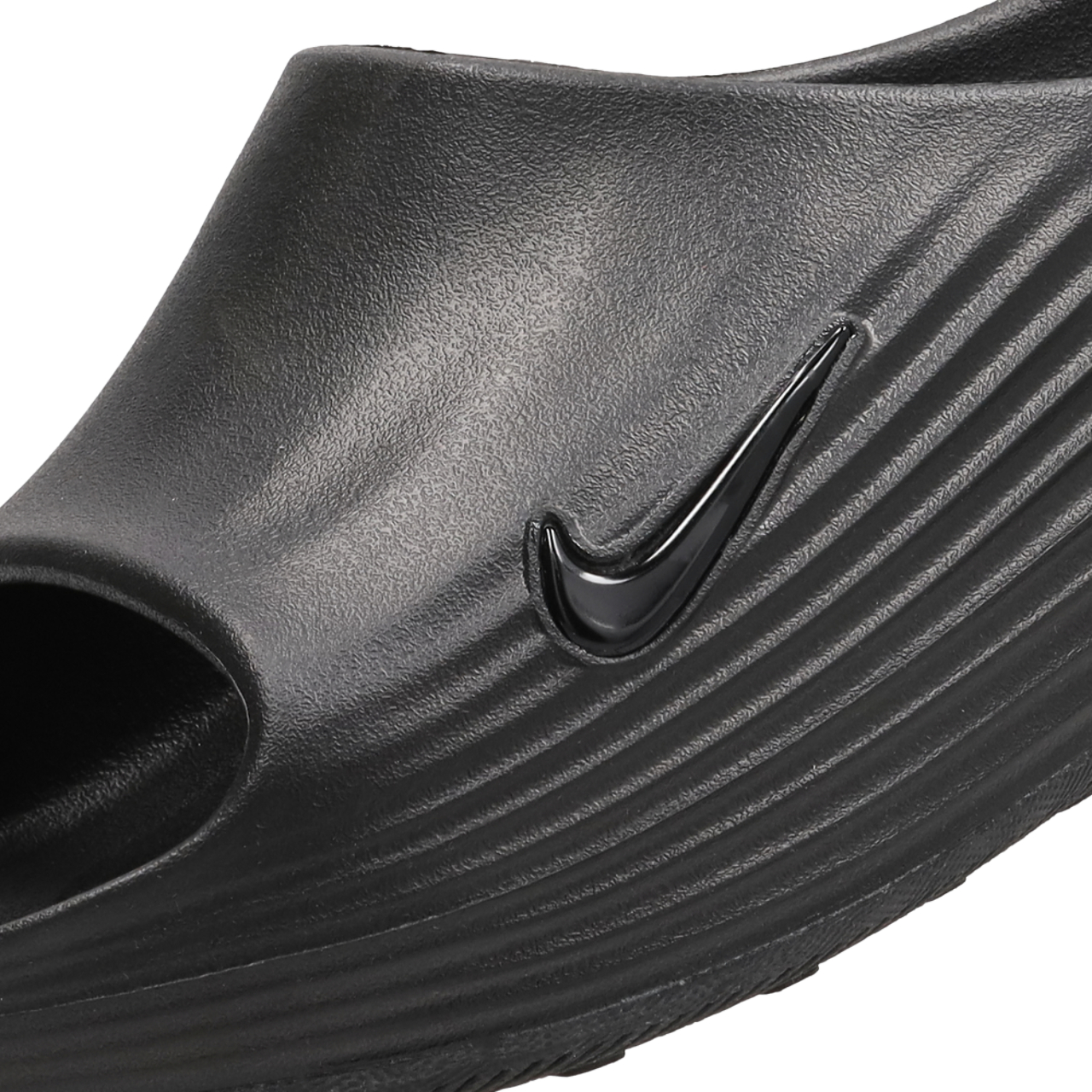 Nike ReactX Rejuven8 Slide Image 7 of 7. Tap to open photo gallery.