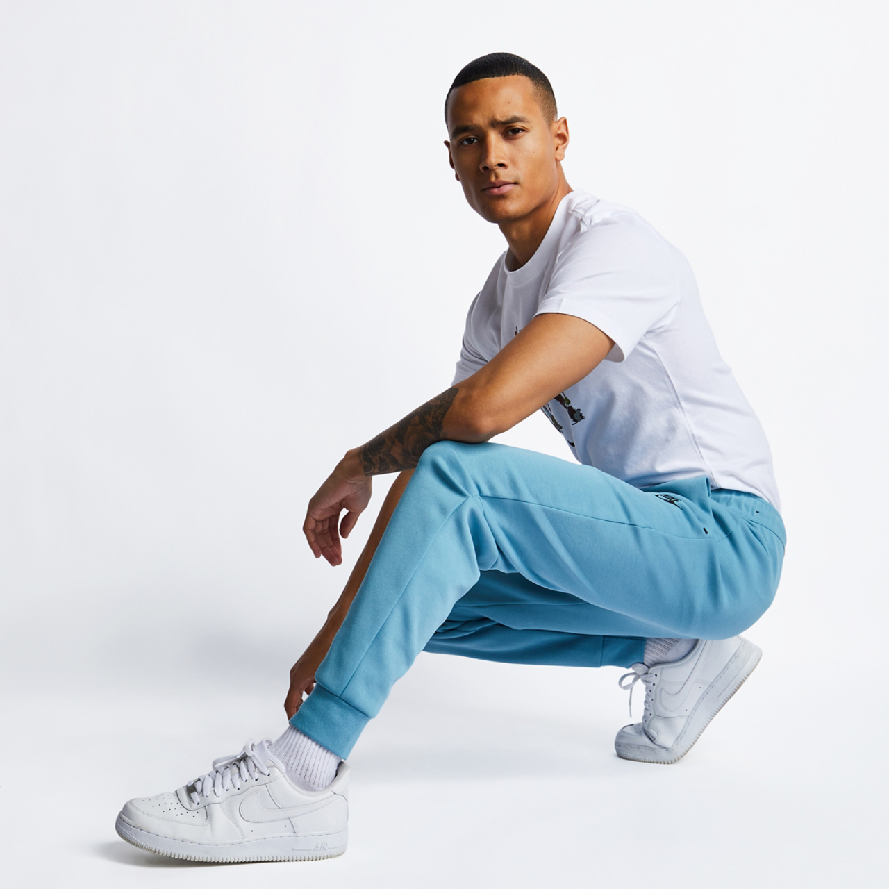 Nike Tech Fleece Cuffed Image 2 of 4. Tap to open photo gallery.