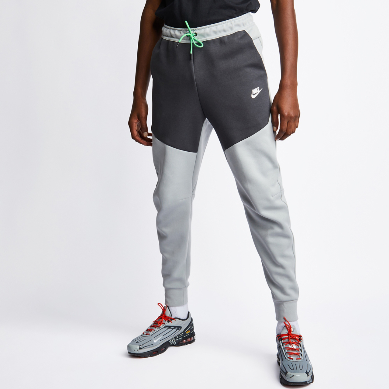 Nike Tech Fleece Cuffed Image 1 of 4. Tap to open photo gallery.