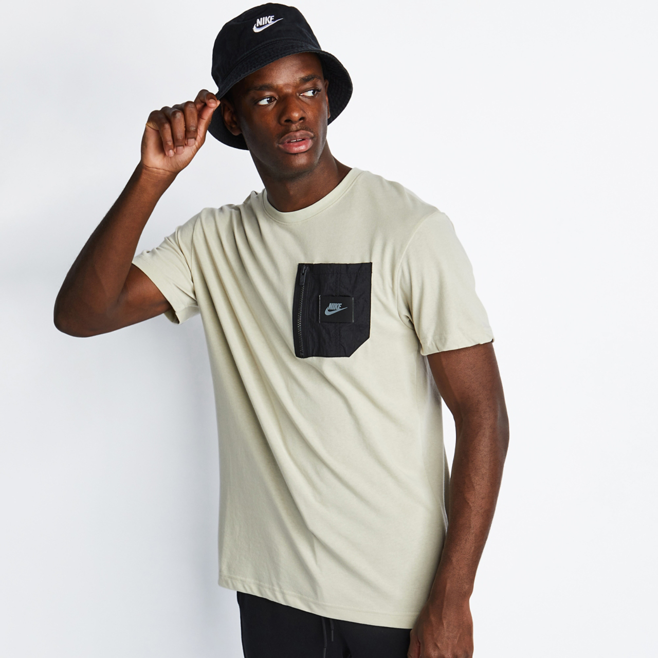 Nike Sportswear Utility Shortsleeve Image 2 of 4. Tap to open photo gallery.