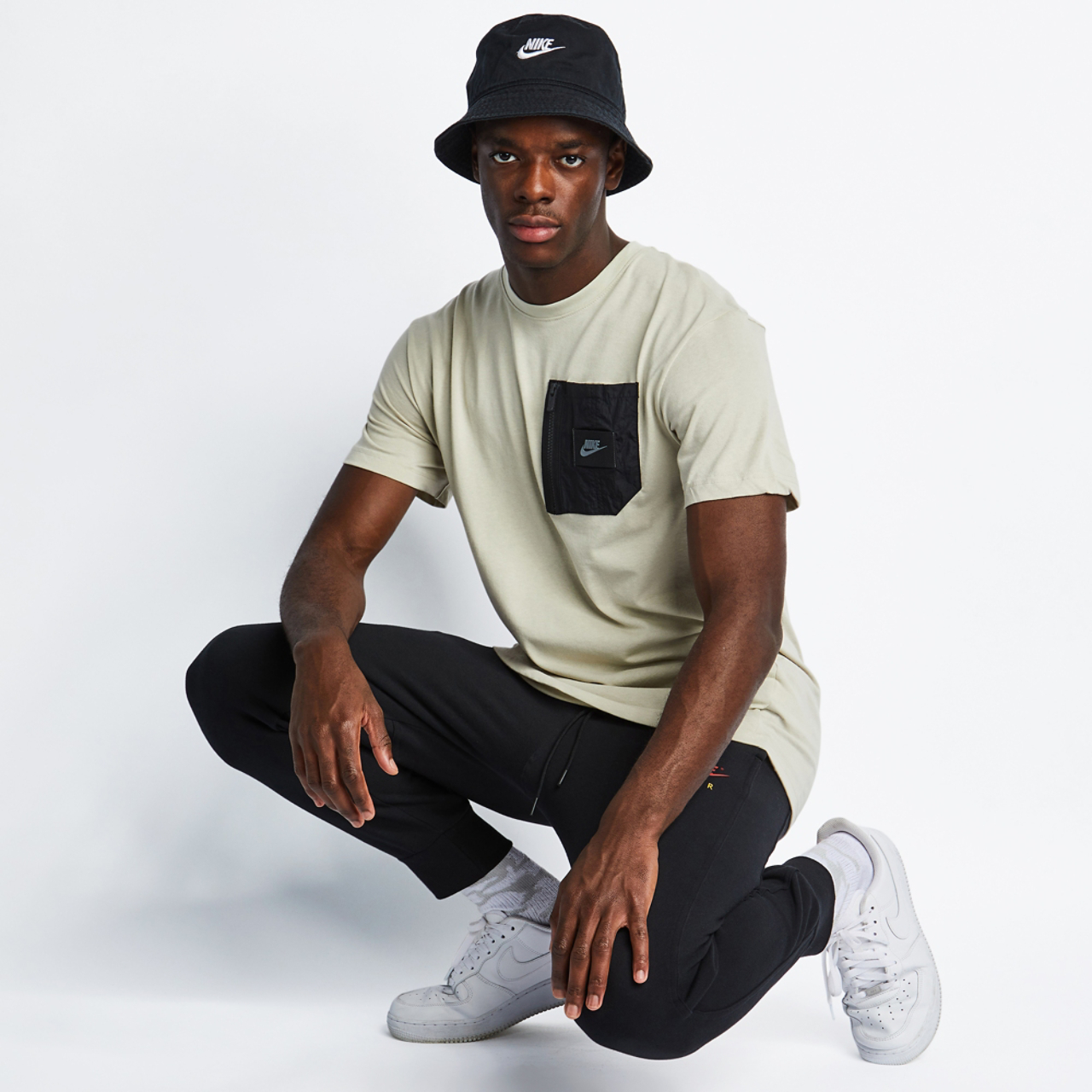 Nike Sportswear Utility Shortsleeve Image 4 of 4. Tap to open photo gallery.