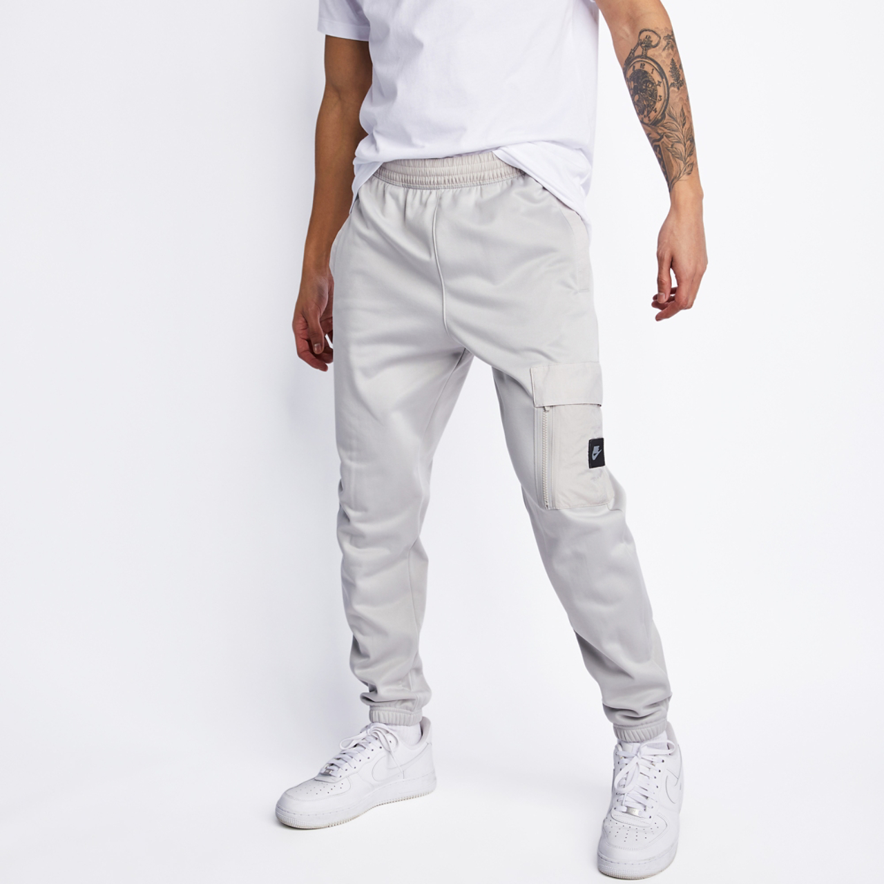 Nike Sportswear Spu Cuffed Pant Image 1 of 4. Tap to open photo gallery.