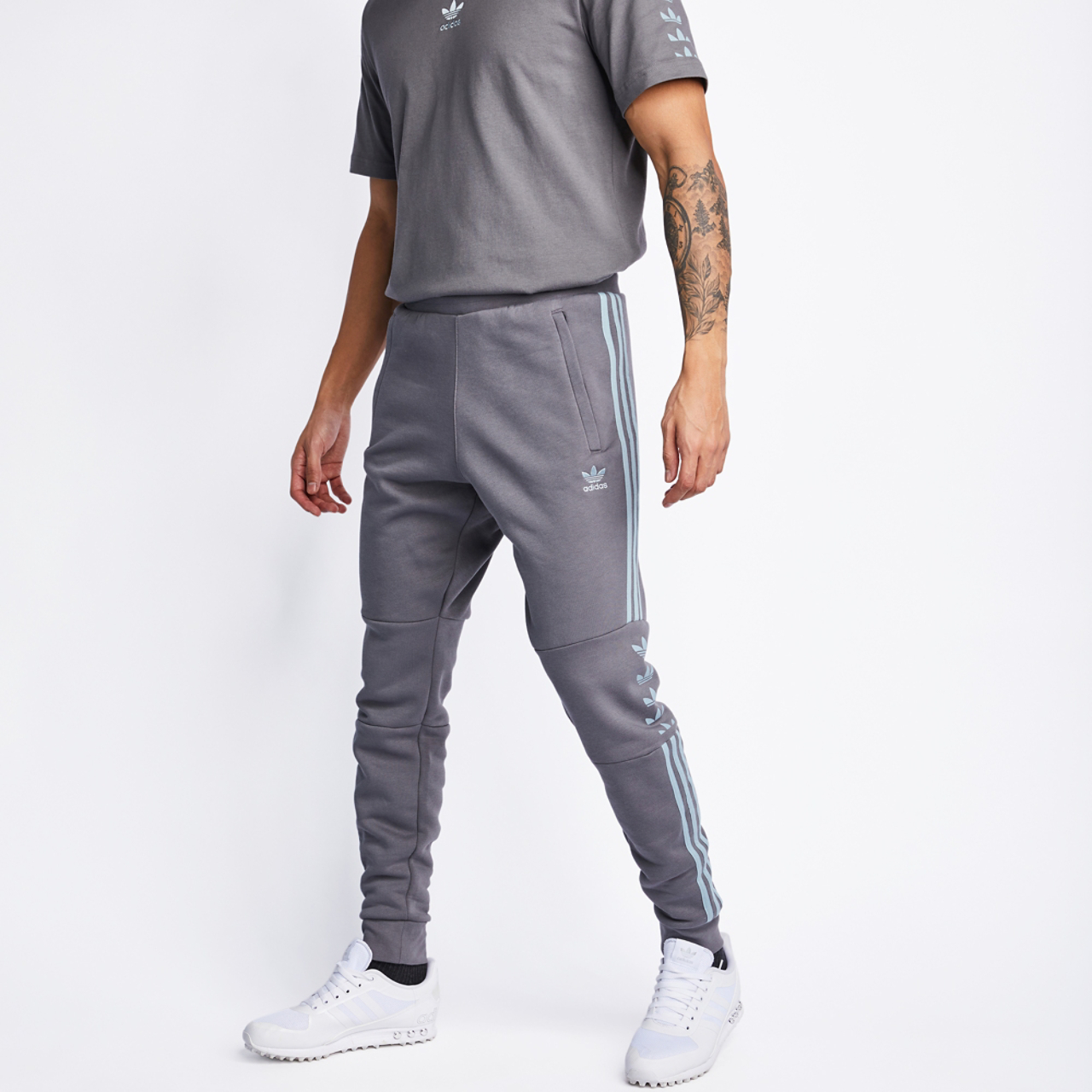 adidas Originals Trefoils Stripes Cuffed Pant Image 1 of 4. Tap to open photo gallery.