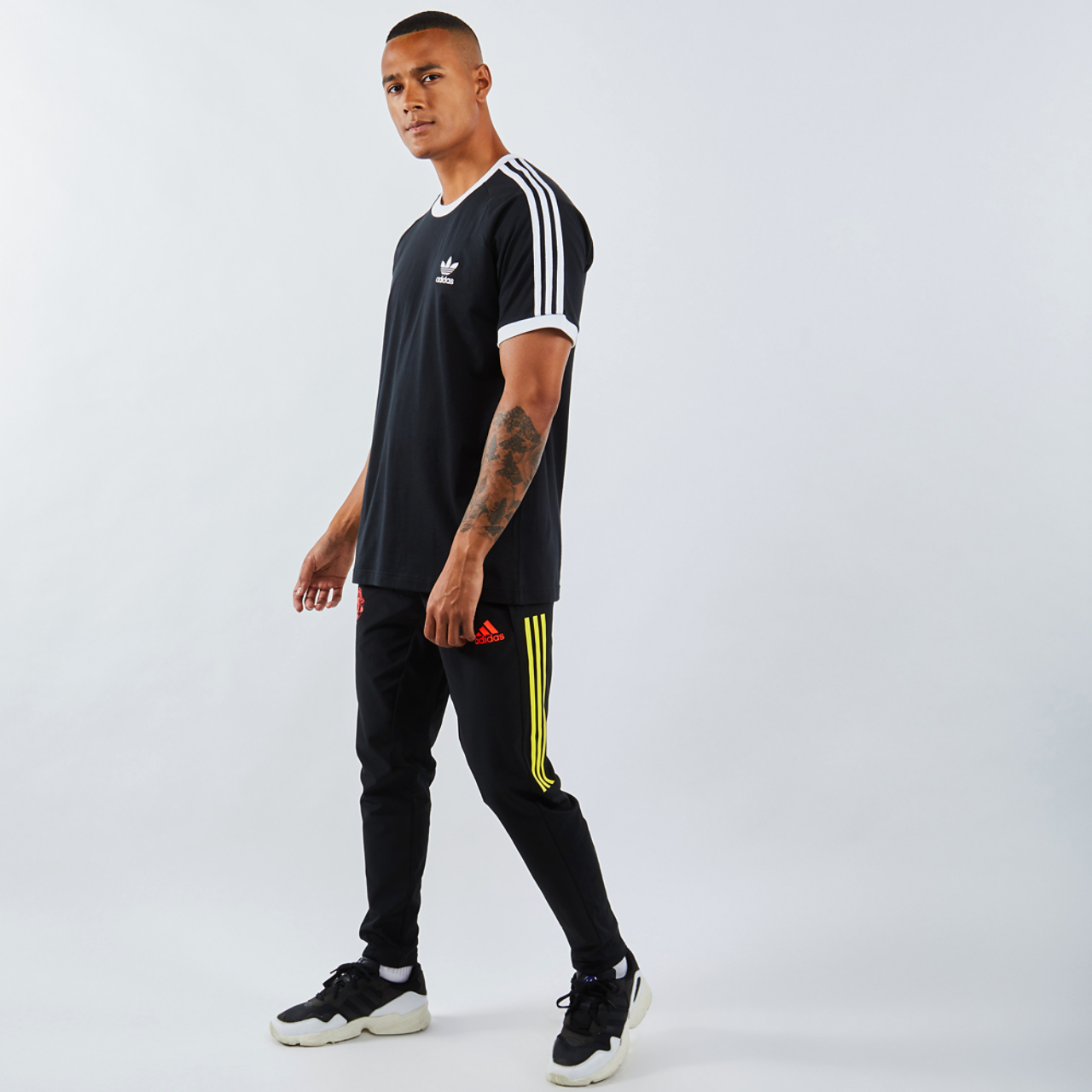 adidas Adicolor 3-Stripesshortsleeve Image 2 of 4. Tap to open photo gallery.
