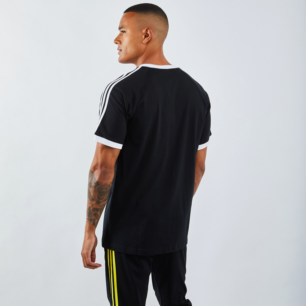 adidas Adicolor 3-Stripesshortsleeve Image 3 of 4. Tap to open photo gallery.