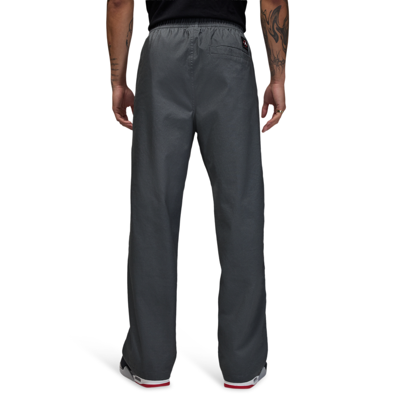 Jordan Essentials Woven Trousers Image 2 of 5. Tap to open photo gallery.