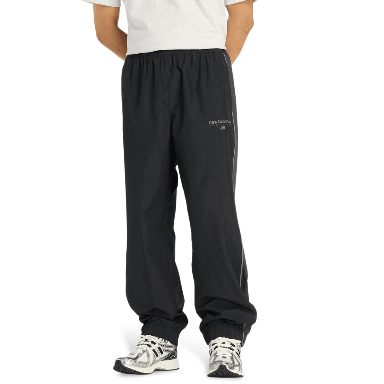 New Balance Trackside Woven Pant Image 1 of 3. Tap to open photo gallery.