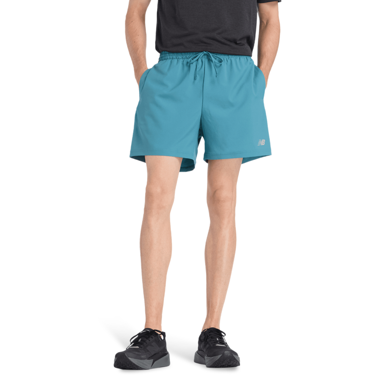 New Balance Sport Essential Short 5Inch Image 1 of 3. Tap to open photo gallery.