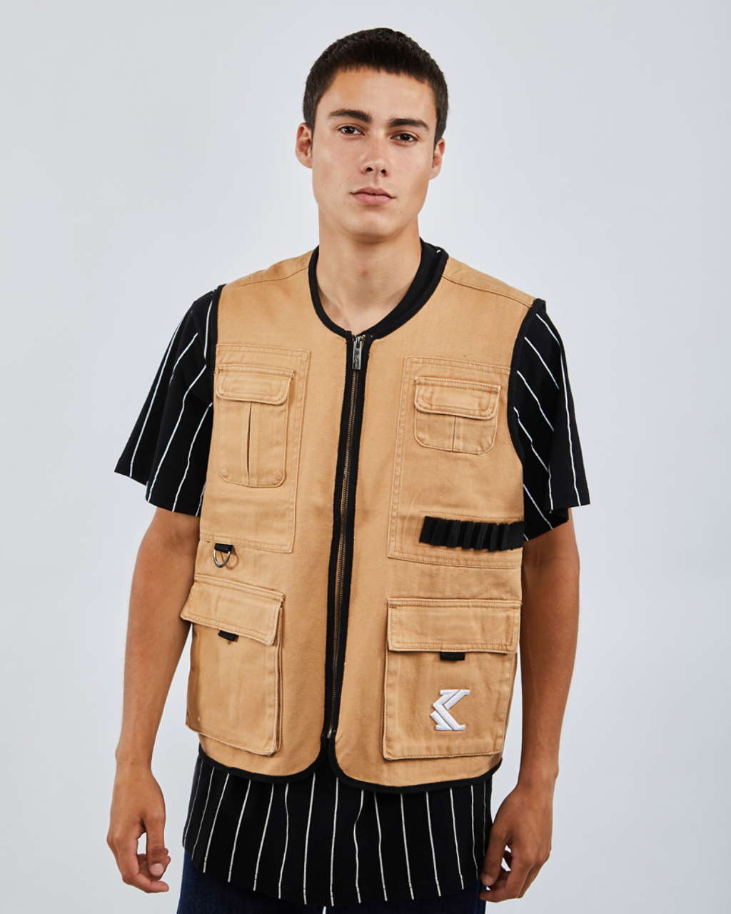 Karl Kani Sand Vest Image 1 of 4. Tap to open photo gallery.