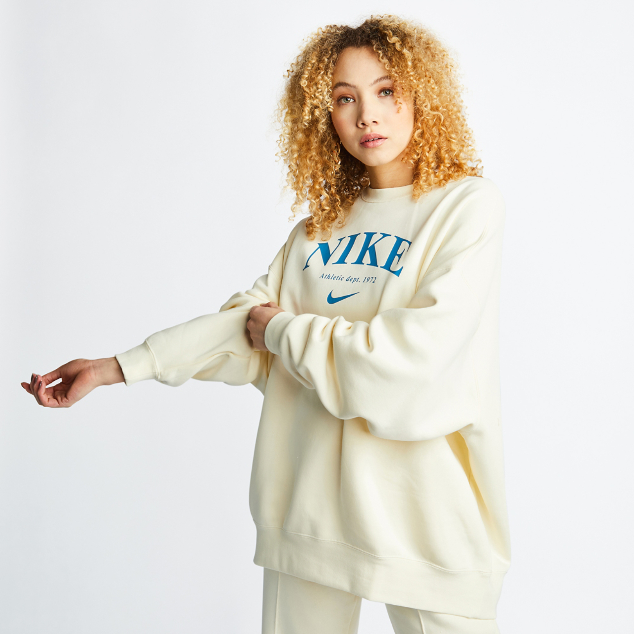 Nike Sportswear Gfx Crew Neck Top Image 1 of 4. Tap to open photo gallery.