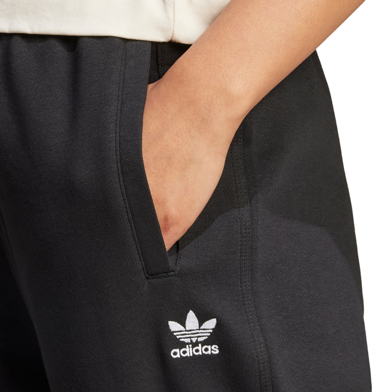 adidas Essentials Fleece Loose Joggers Afbeelding 4 van 4. Tik om de fotogalerij te openen..