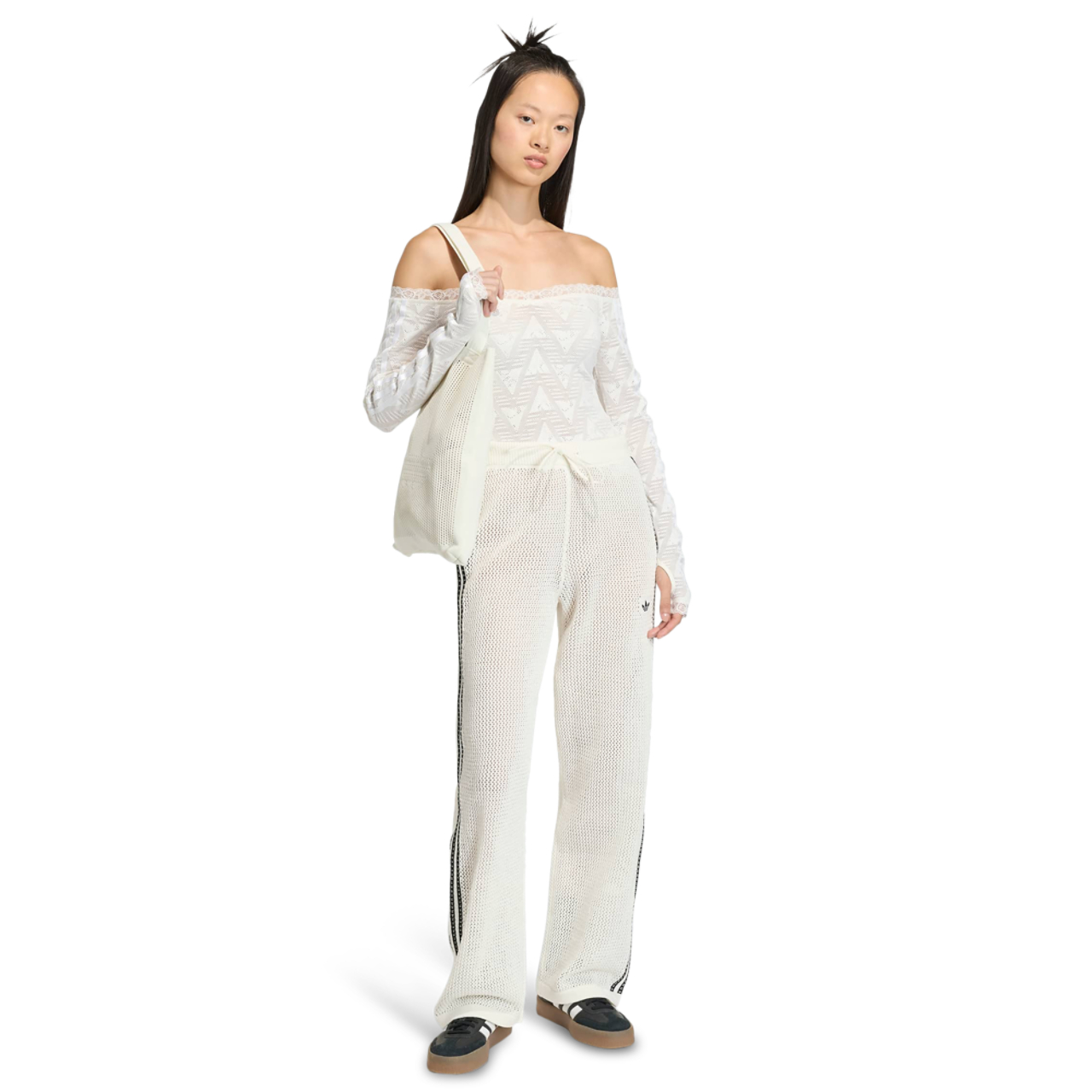 adidas Knitted Crochet Firebird Track Pants Immagine 2 di 5. Tocca per aprire la galleria fotografica.