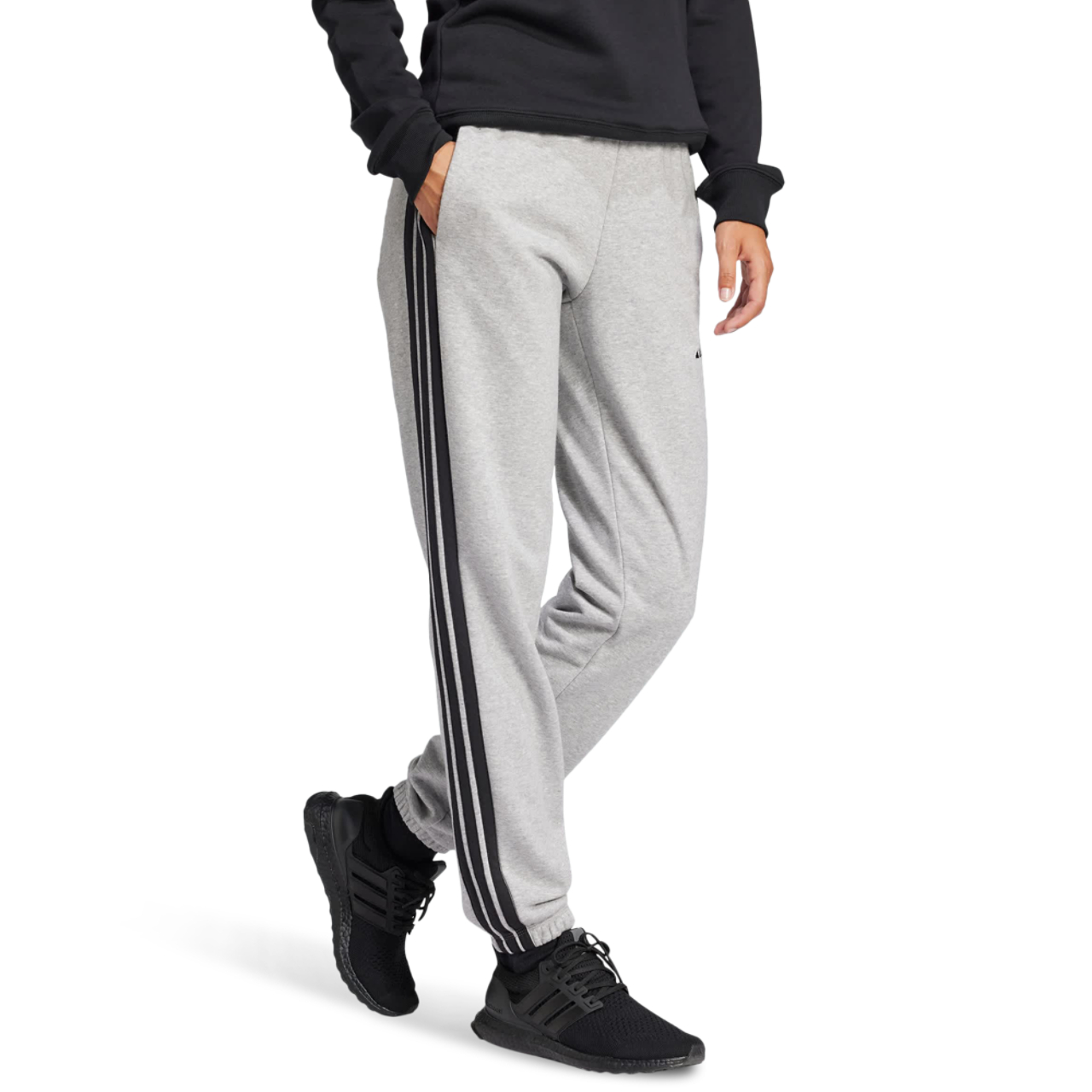 adidas Essentials 3-Stripes Cuffed Joggers + Immagine 2 di 5. Tocca per aprire la galleria fotografica.