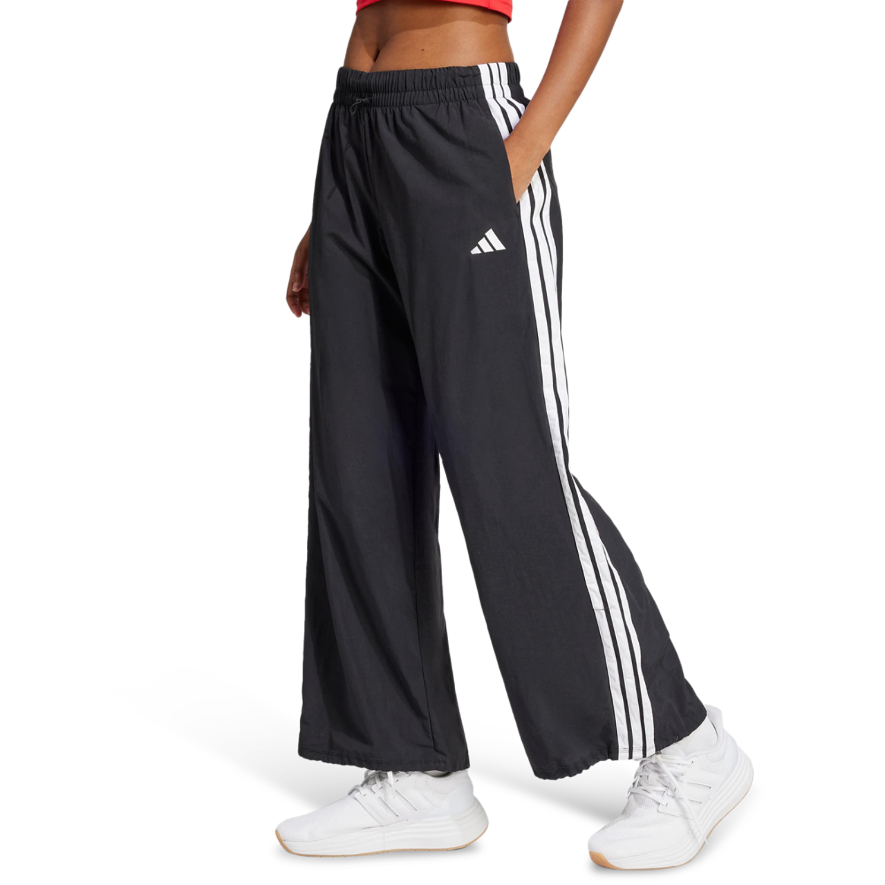 adidas Essentials 3-Stripes Parachute Bottoms Image 1 of 5. Tap to open photo gallery.