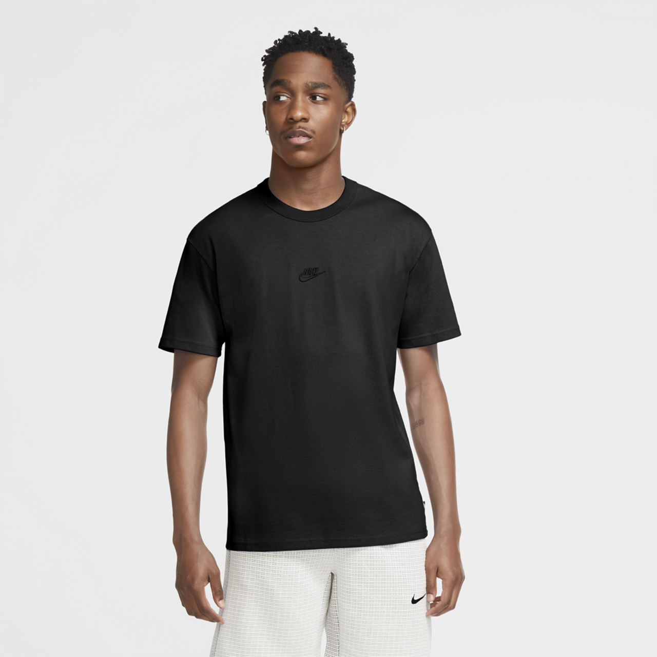Nike Premium Essentials T-Shirt Image 1 of 2. Tap to open photo gallery.