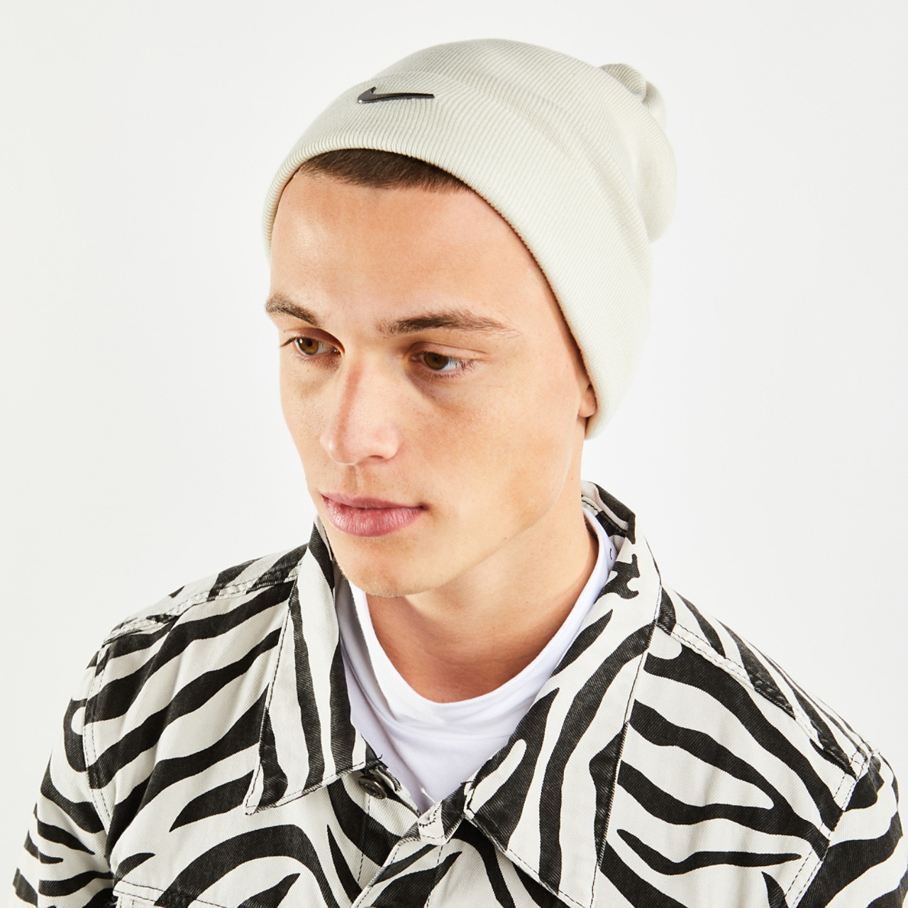 Nike Metal Swoosh Cuffed Image 1 of 1. Tap to open photo gallery.