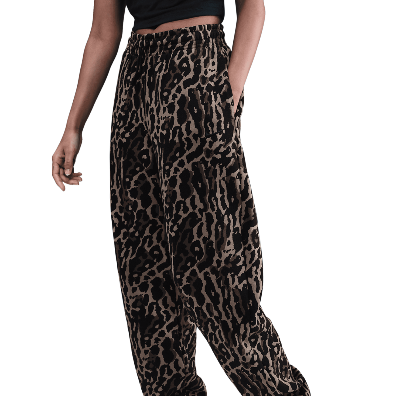 Nike NSW Phoenix Fleece All Over Print Pants Image 1 of 6. Tap to open photo gallery.