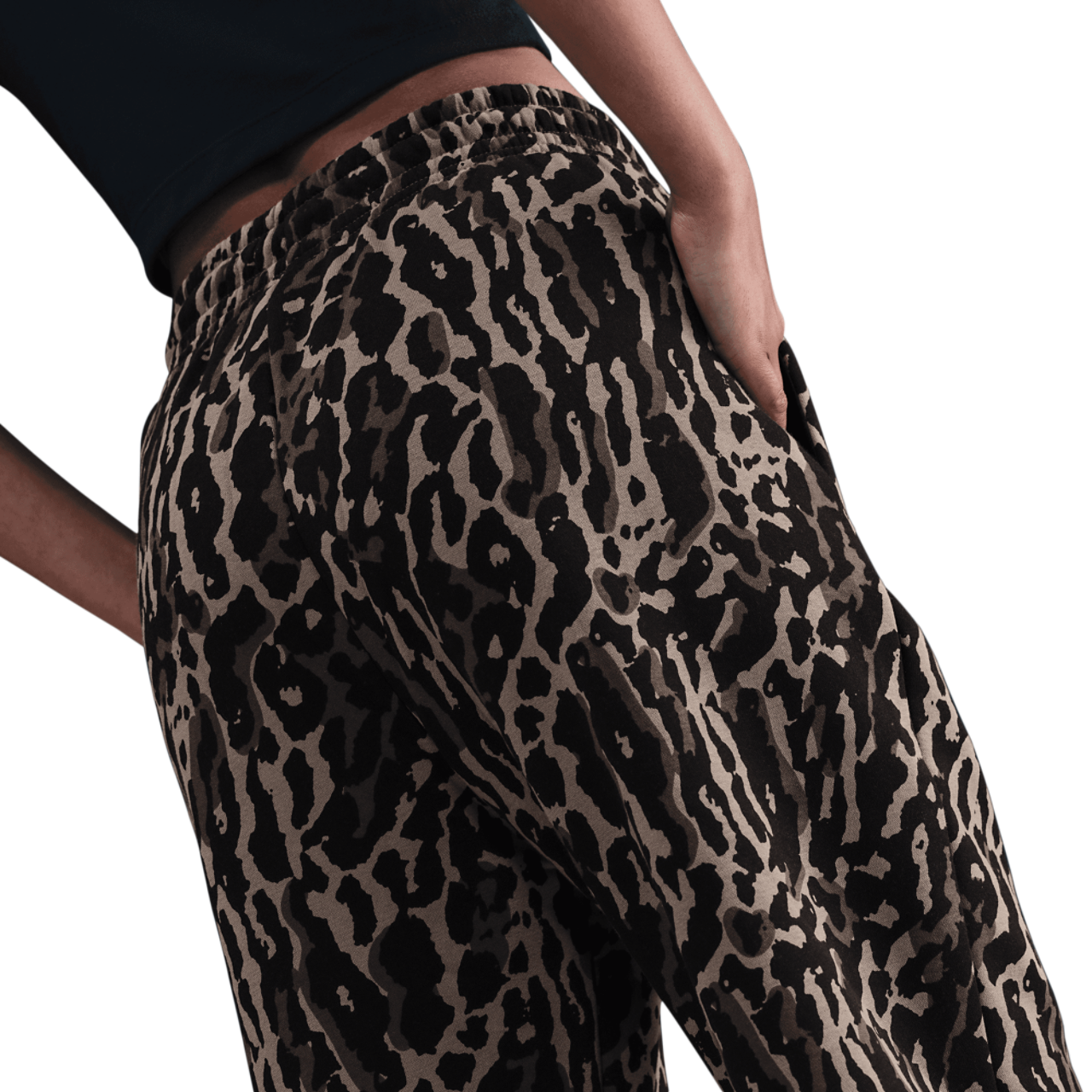 Nike NSW Phoenix Fleece All Over Print Pants Image 2 of 6. Tap to open photo gallery.