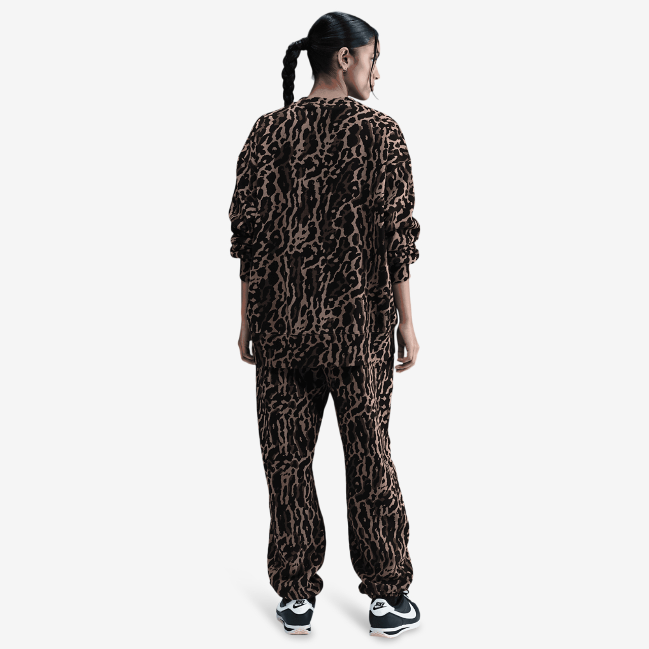 Nike NSW Phoenix Fleece All Over Print Pants Image 6 of 6. Tap to open photo gallery.