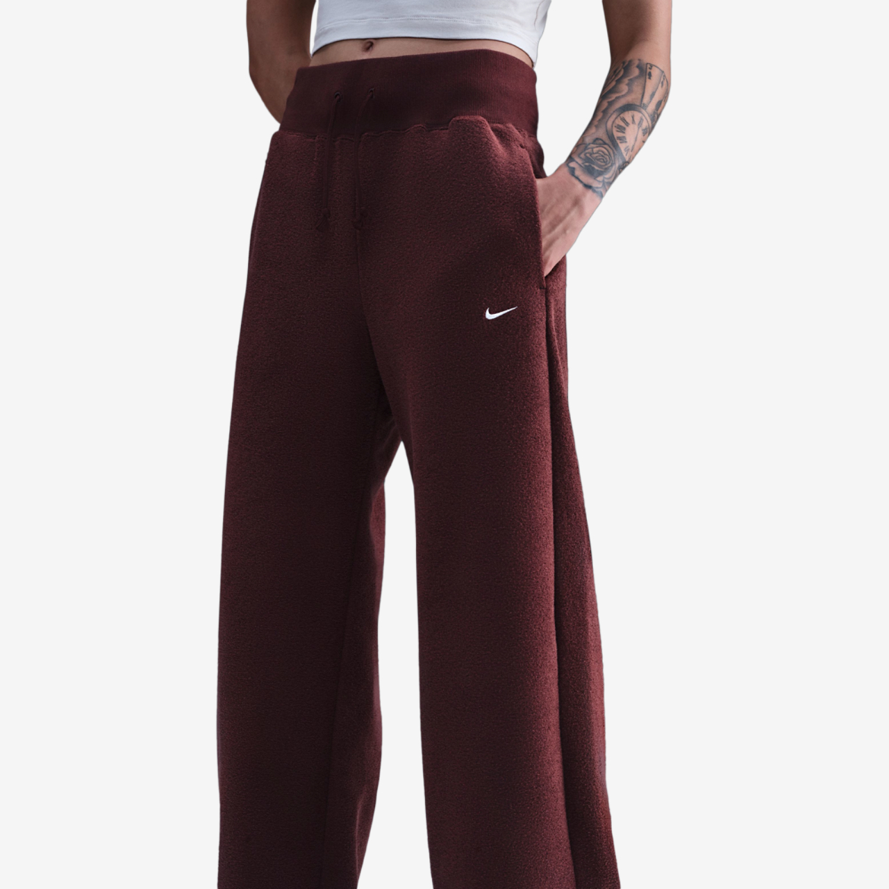 Nike NSW Phoenix Plush Wide Pants Image 1 of 5. Tap to open photo gallery.