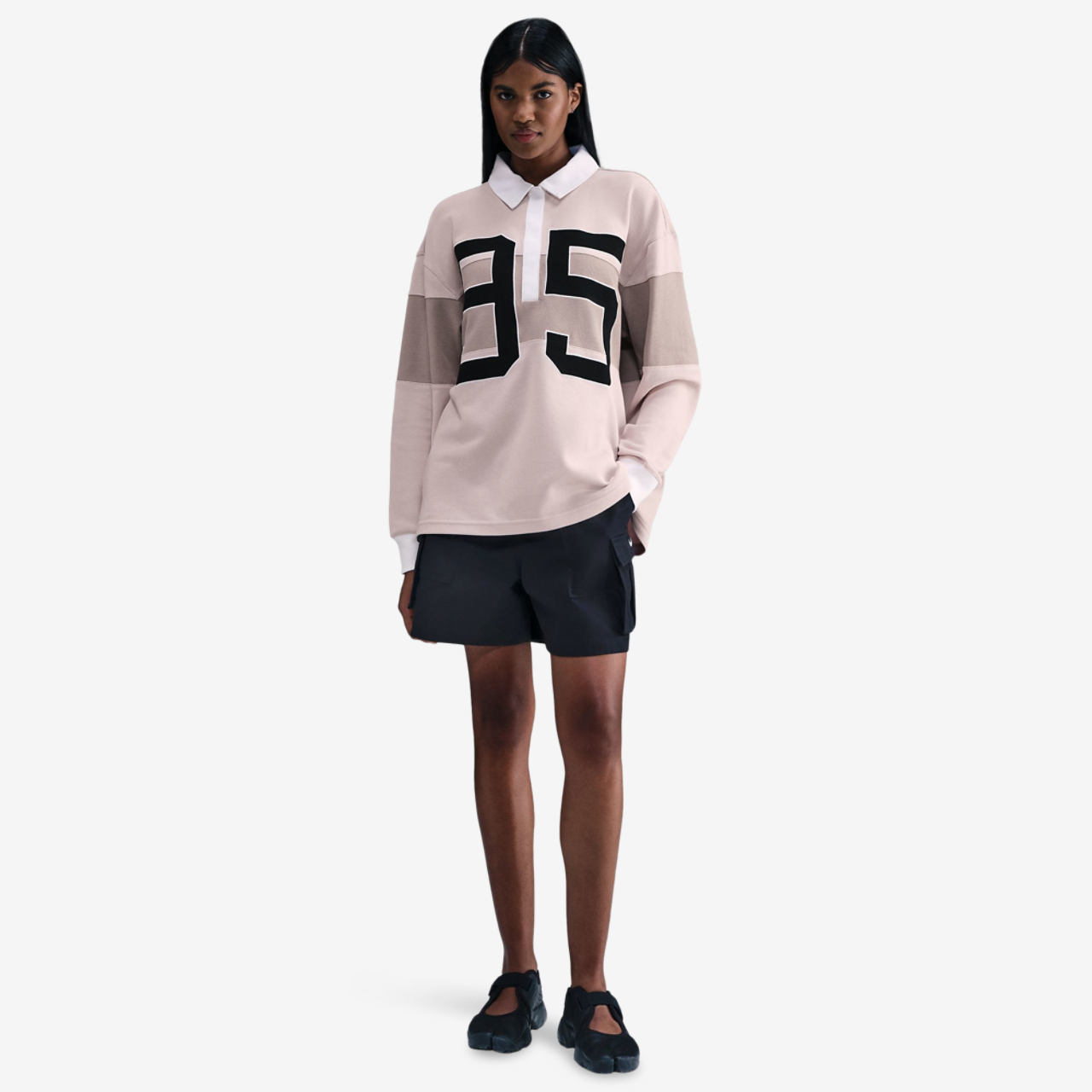 Nike NSW Street Long Sleeve GFX Polo Image 1 of 2. Tap to open photo gallery.