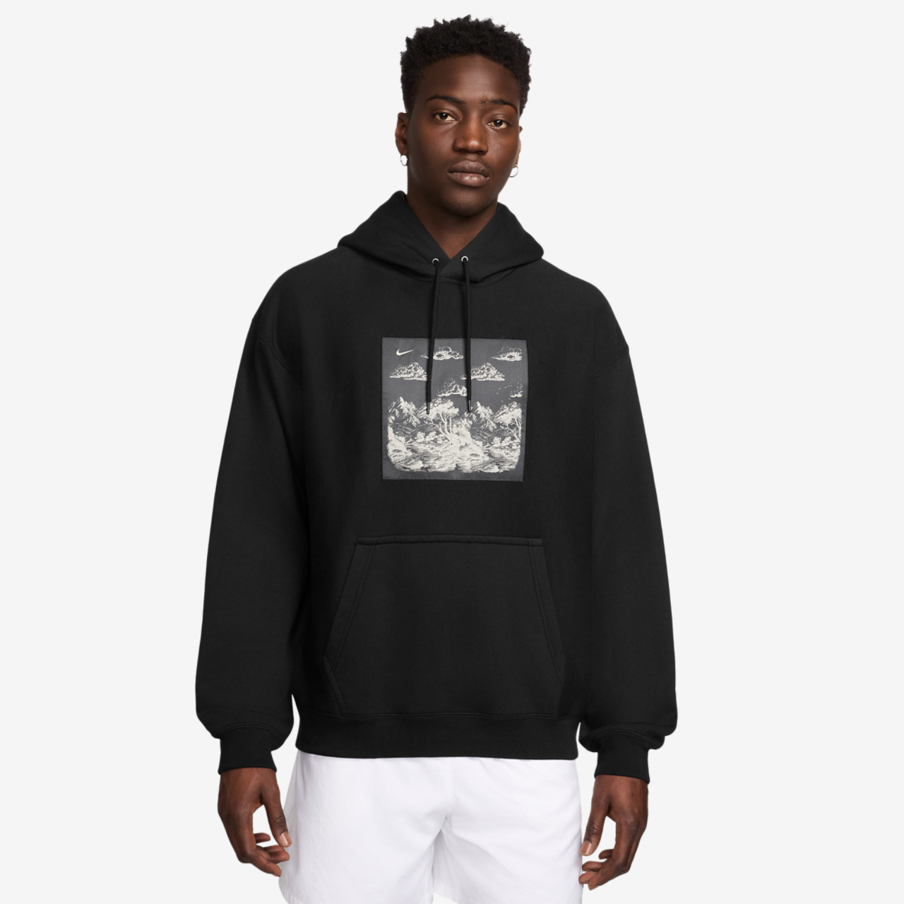 Nike NL Solo Swoosh Pullover Hood Gfx Image 1 of 3. Tap to open photo gallery.