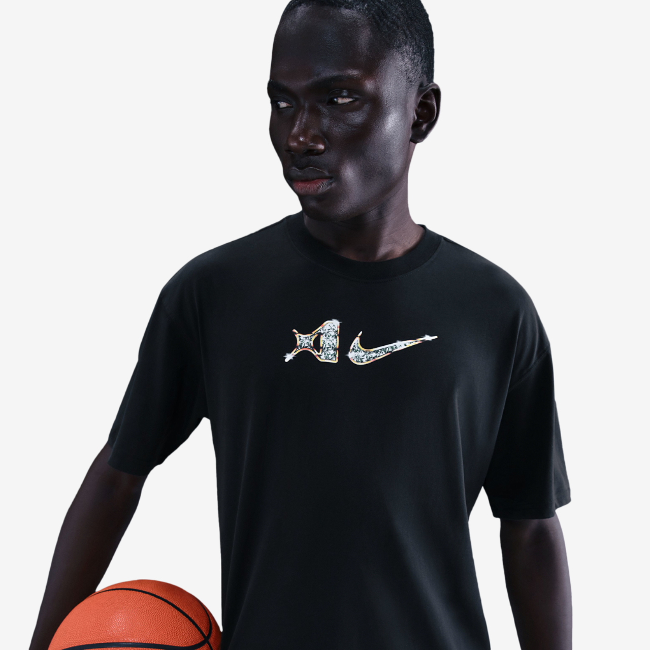 Nike Dri-FIT A'ja Short Sleeve T-Shirt Image 1 of 2. Tap to open photo gallery.