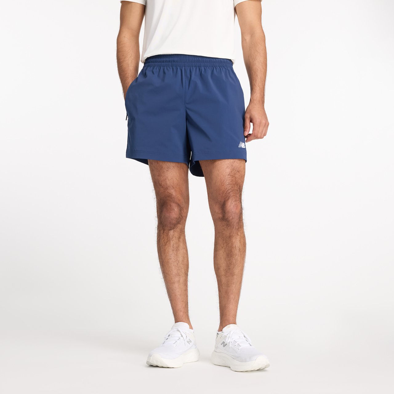 New Balance Athletics Stretch Woven 5" Shorts Image 1 of 4. Tap to open photo gallery.