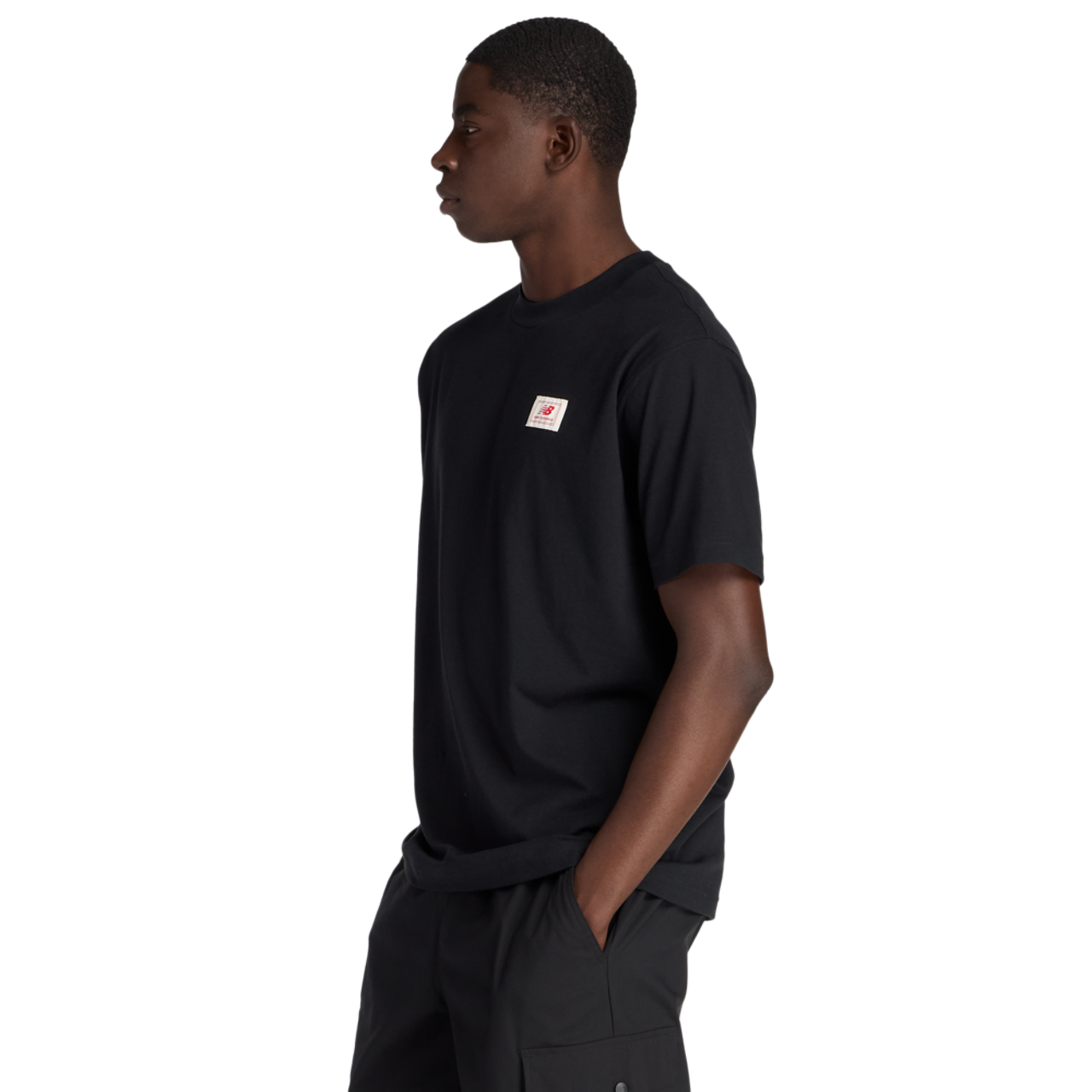 New Balance Woven Label T-Shirt Image 3 of 6. Tap to open photo gallery.