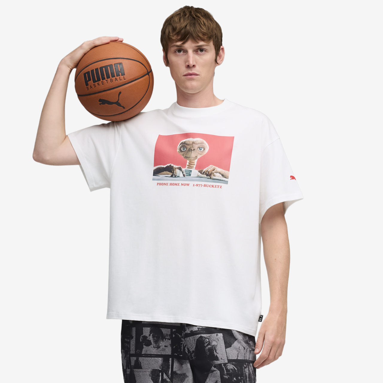 PUMA Hoops X E.T. T-Shirt I Image 1 of 7. Tap to open photo gallery.