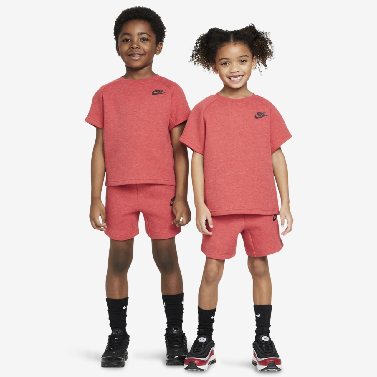 Nike Tech Fleece T-Shirt And Shorts Set Image 1 of 10. Tap to open photo gallery.