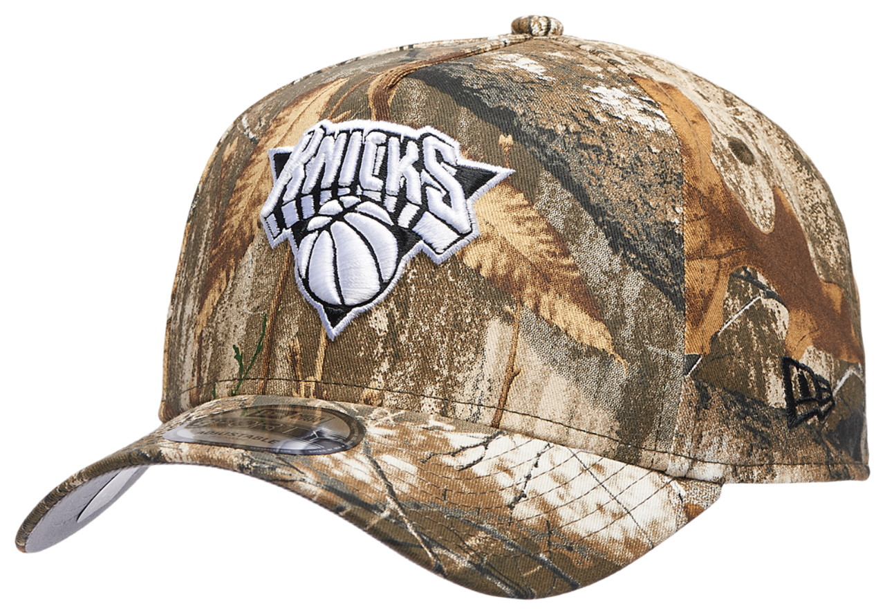 New Era Knicks 9FORTY A-Frame Realtree Cap Image 1 of 5. Tap to open photo gallery.