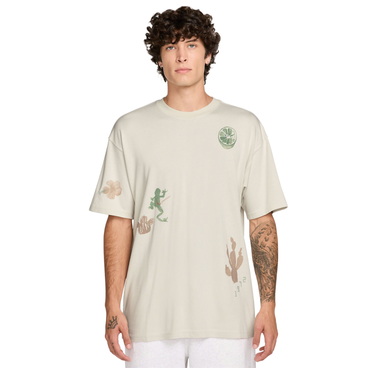 Nike NSW Tropical Loose Edition T-Shirt  Image 1 of 3. Tap to open photo gallery.