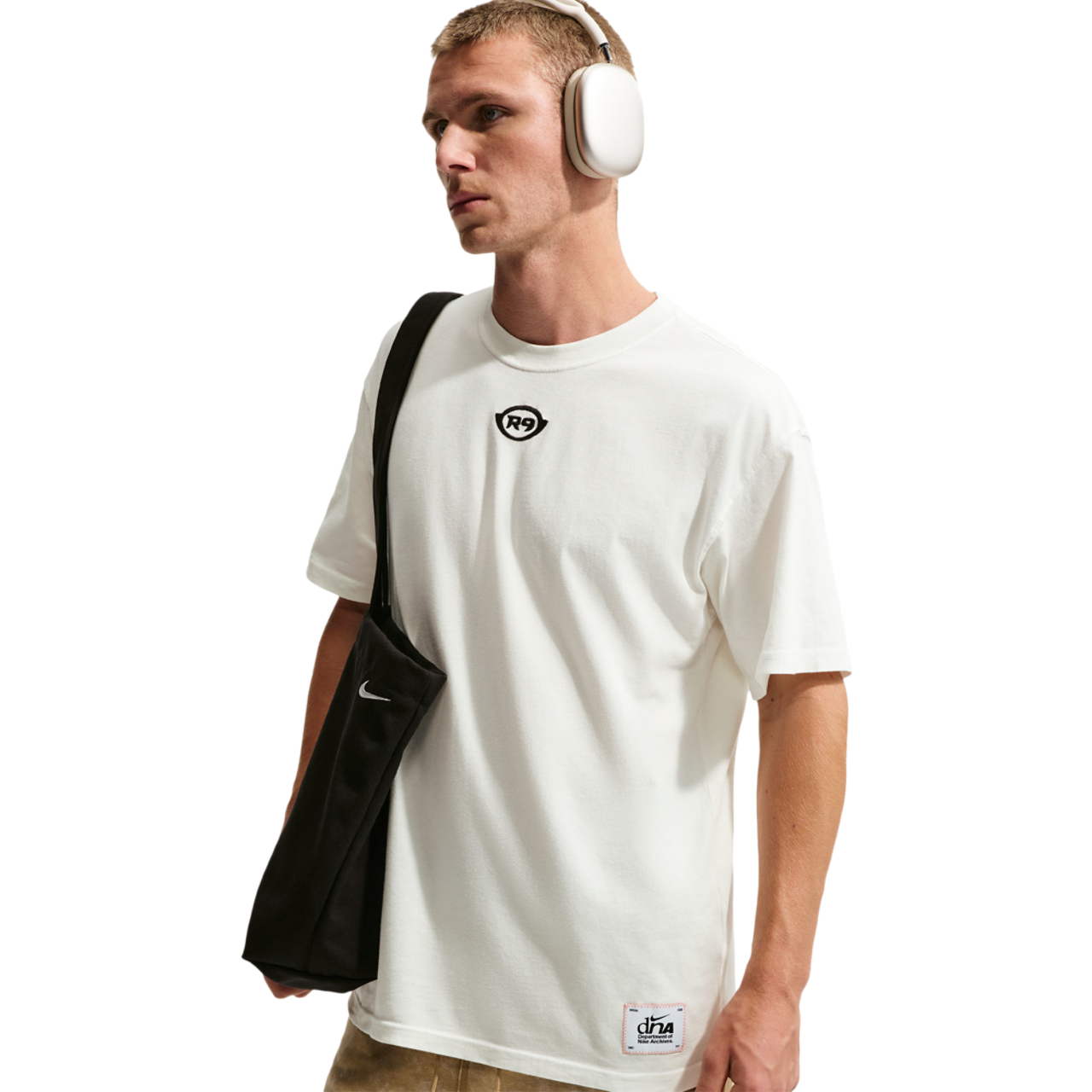Nike NSW LSE GFB Photo T-Shirt  Image 1 of 3. Tap to open photo gallery.