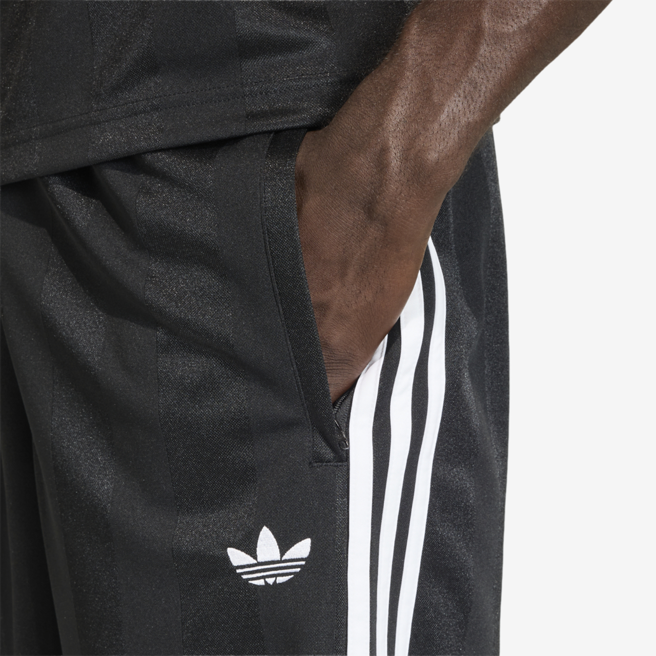 adidas 3 Stripes Loose Engineered Shorts 8" Image 3 of 4. Tap to open photo gallery.