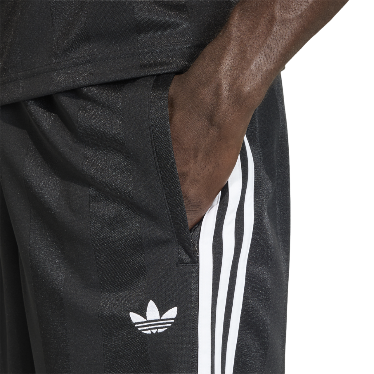 adidas 3 Stripes Loose Engineered Shorts 8" Image 3 of 4. Tap to open photo gallery.