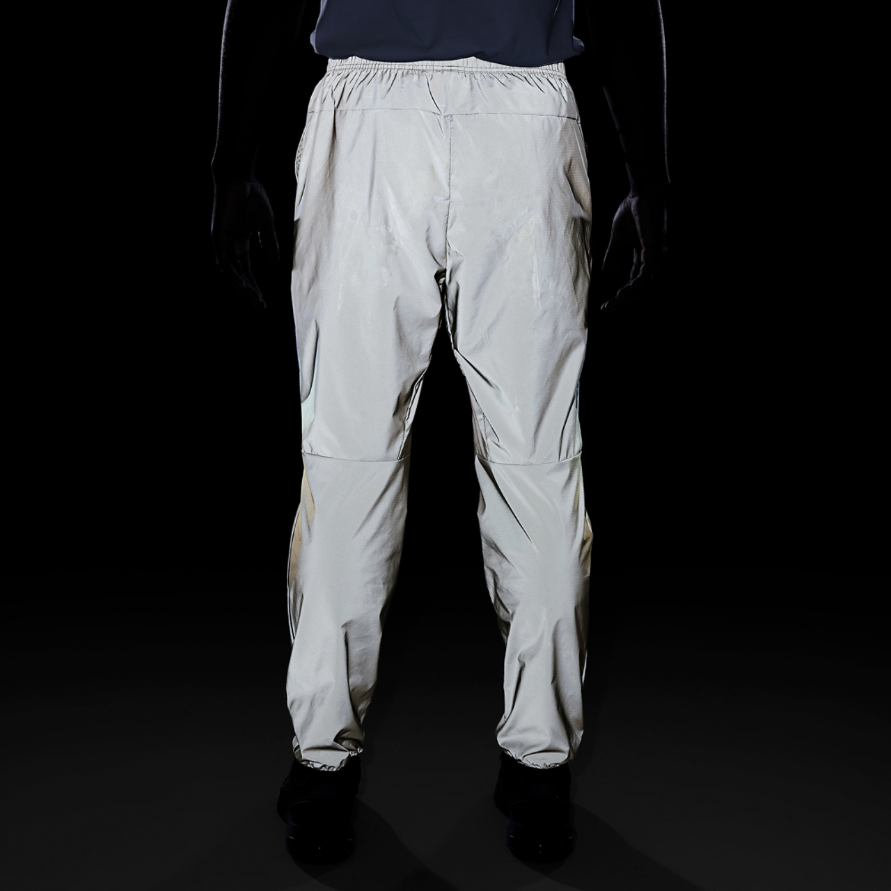 Nike Reflect Tech Woven Pants  Image 7 of 7. Tap to open photo gallery.