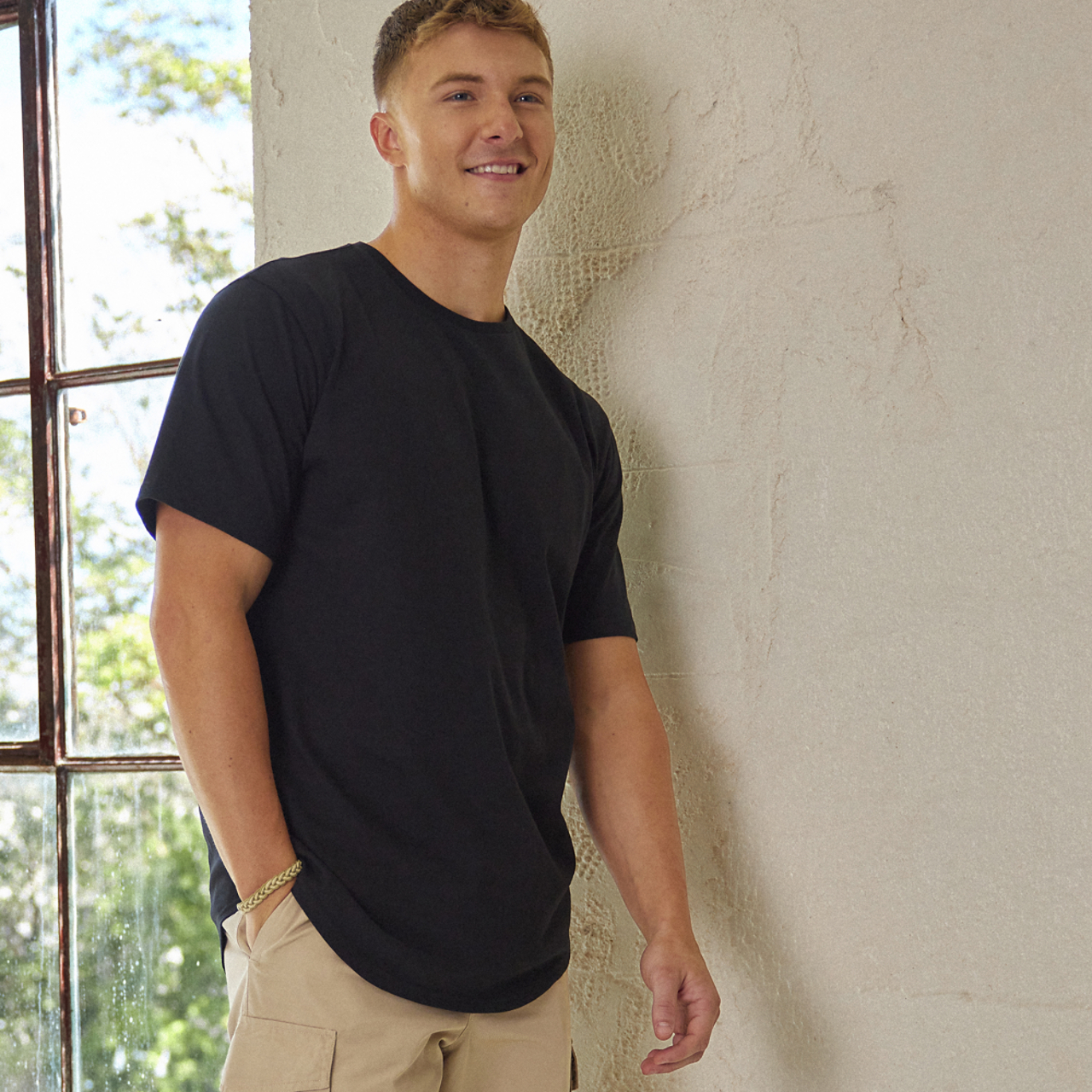 CSG Curve Hem T-Shirt Image 1 of 2. Tap to open photo gallery.