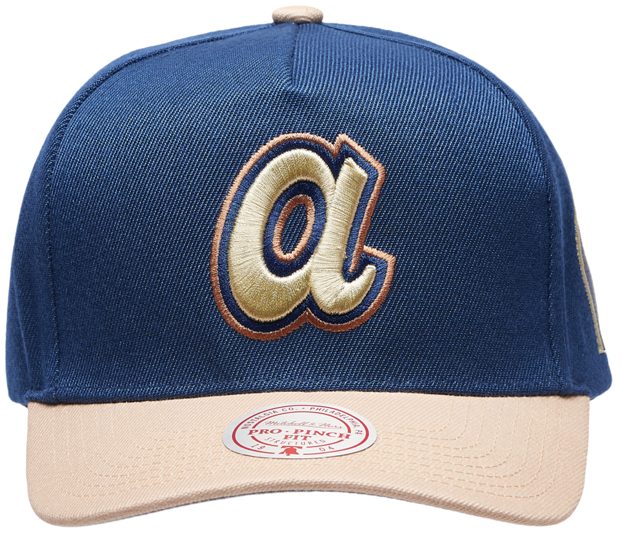 Mitchell & Ness Braves Navy & Tan Pro Pinch Cap Image 2 of 5. Tap to open photo gallery.